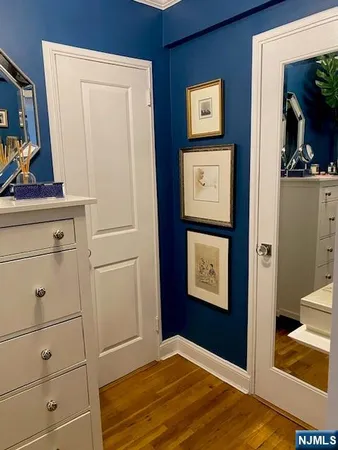 a view of a hallway with closet