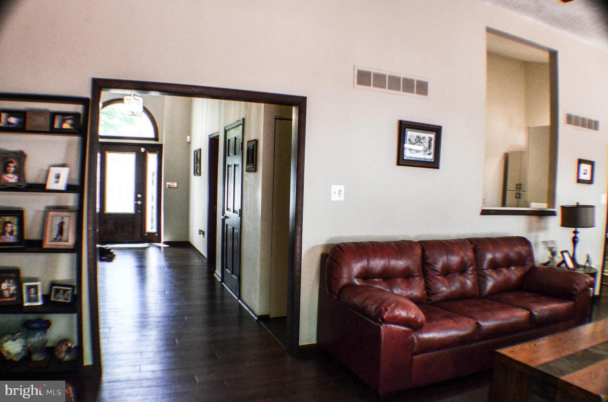 1700 Abelia Road Fallston, MD 21047 - Photo 6 of 30 a living room with furniture and wooden floor