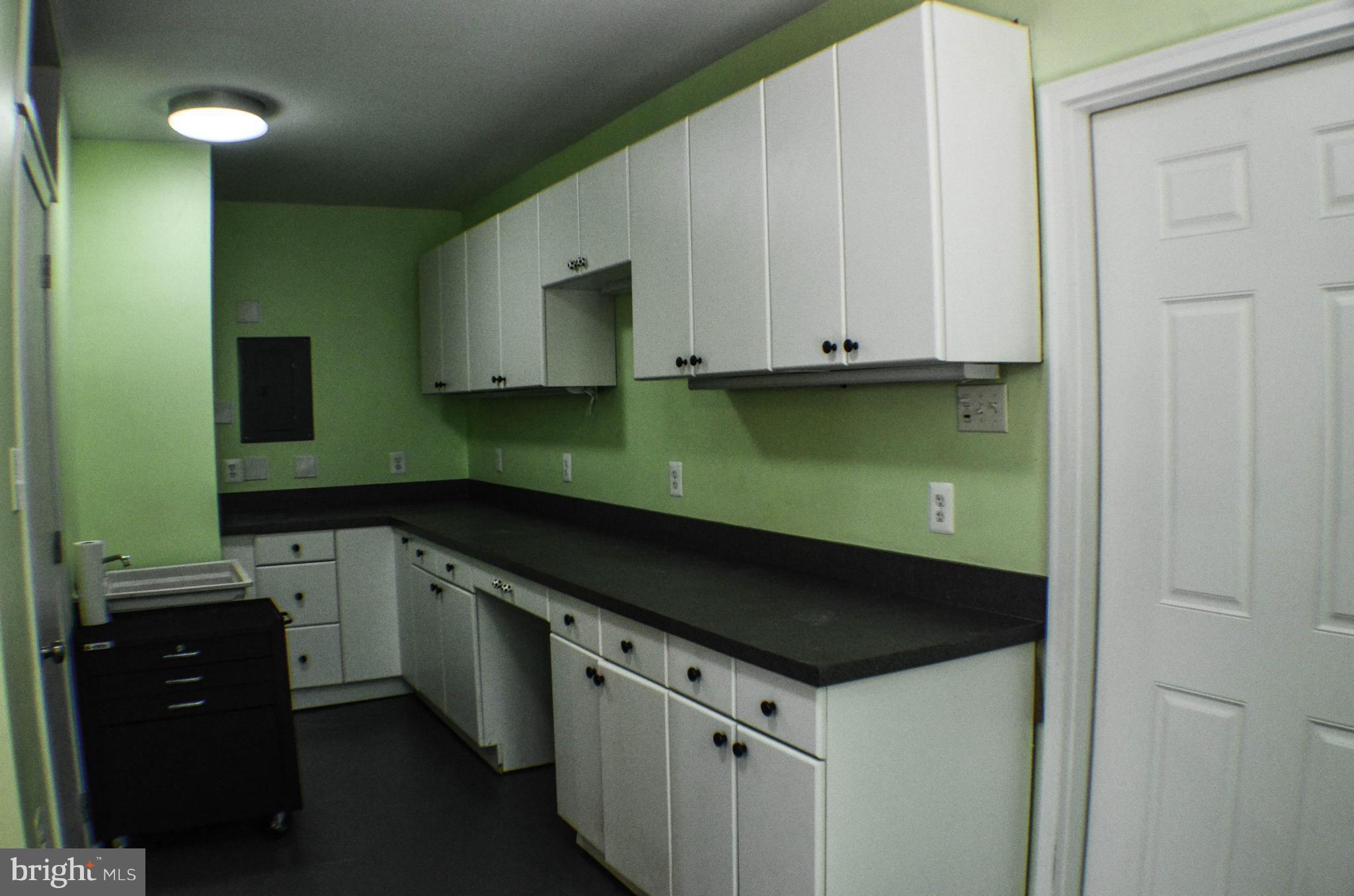 1700 Abelia Road Fallston, MD 21047 - Photo 10 of 30 a kitchen with white cabinets and a sink