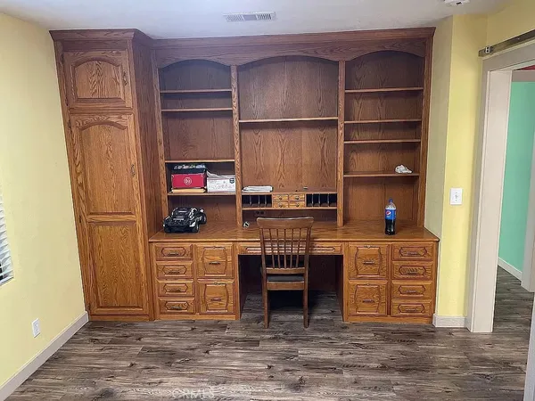 a kitchen with stainless steel appliances granite countertop a stove and a refrigerator