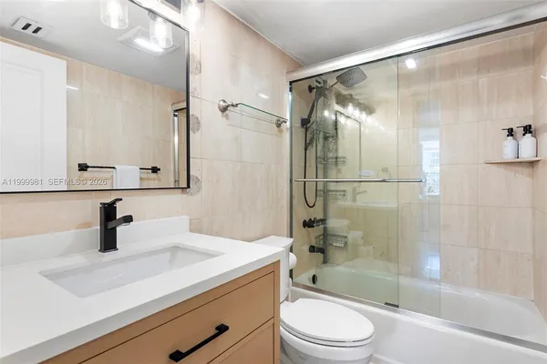 a room with a bed and a window