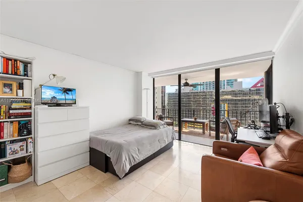 a bedroom with a bed and closet