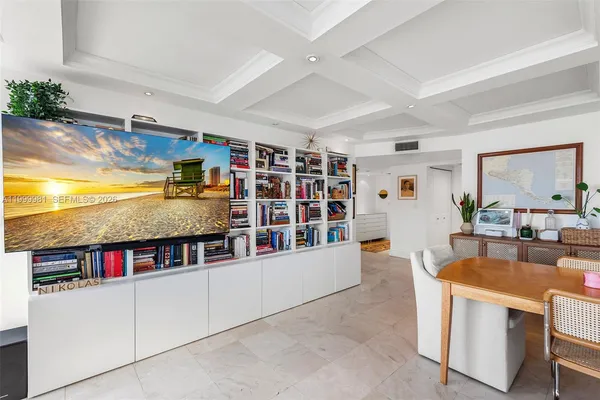 a kitchen with stainless steel appliances granite countertop a lot of cabinets a sink and a counter space