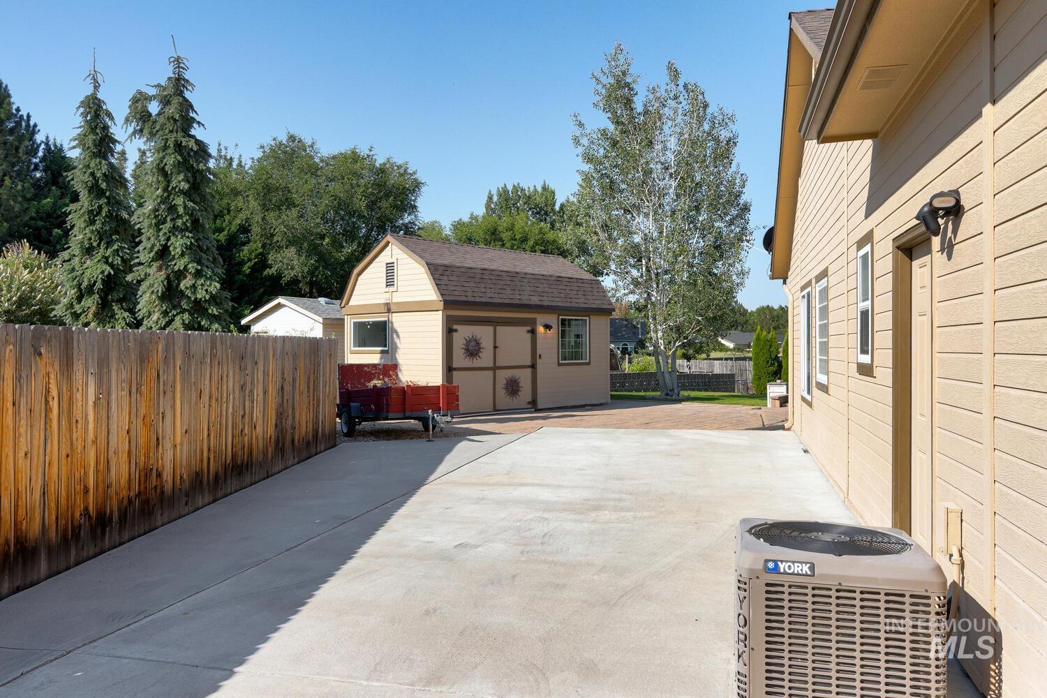10585 West Vega Court Star, ID 83669 - Photo 47 of 49 View of patio with an outbuilding