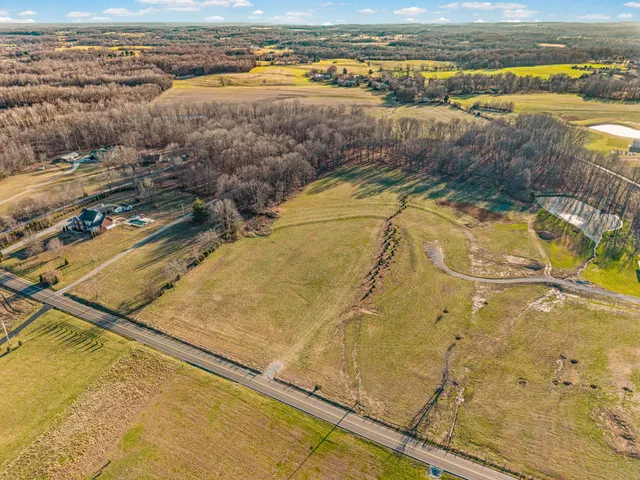 a view of a swimming pool with a lake view