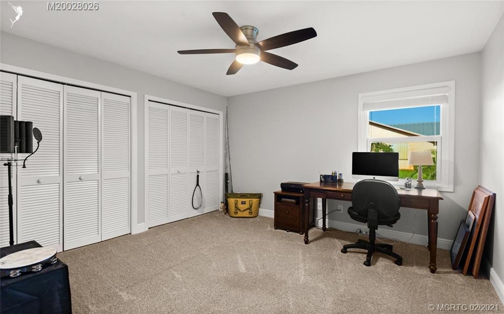 5321 Southeast Sterling Circle Stuart, FL 34997 - Photo 21 of 29 a work room with furniture and a window