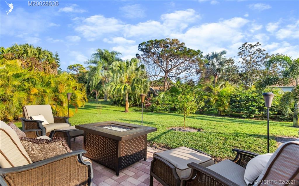 5321 Southeast Sterling Circle Stuart, FL 34997 - Photo 27 of 29 a view of a garden with furniture