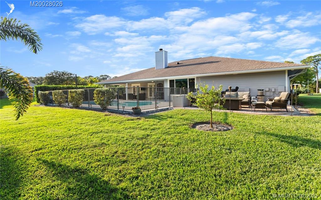 5321 Southeast Sterling Circle Stuart, FL 34997 - Photo 28 of 29 a swimming pool view with a seating space