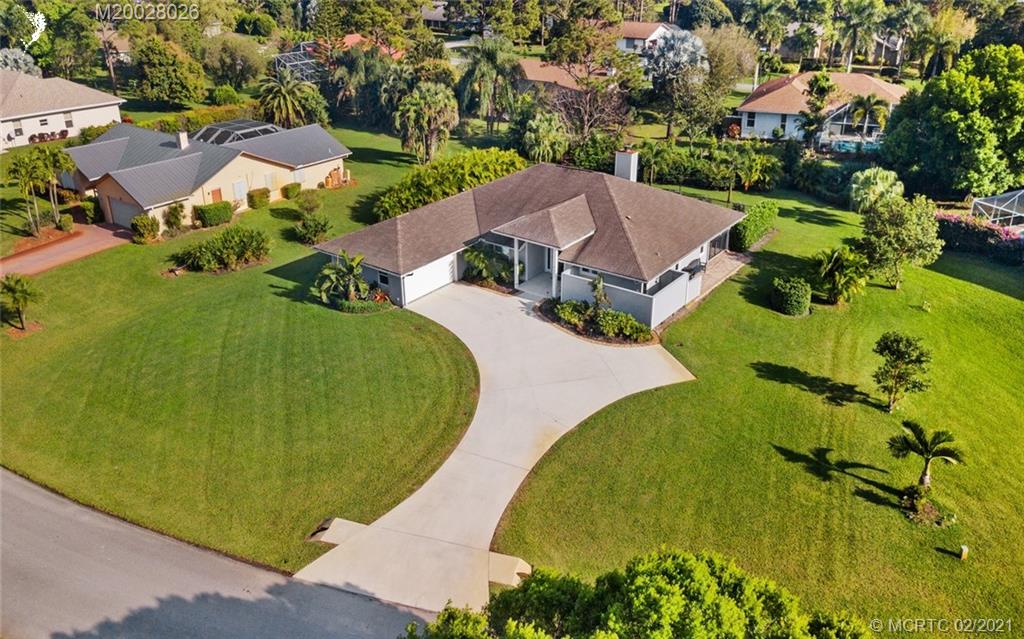 5321 Southeast Sterling Circle Stuart, FL 34997 - Photo 5 of 29 an aerial view of a house with a garden