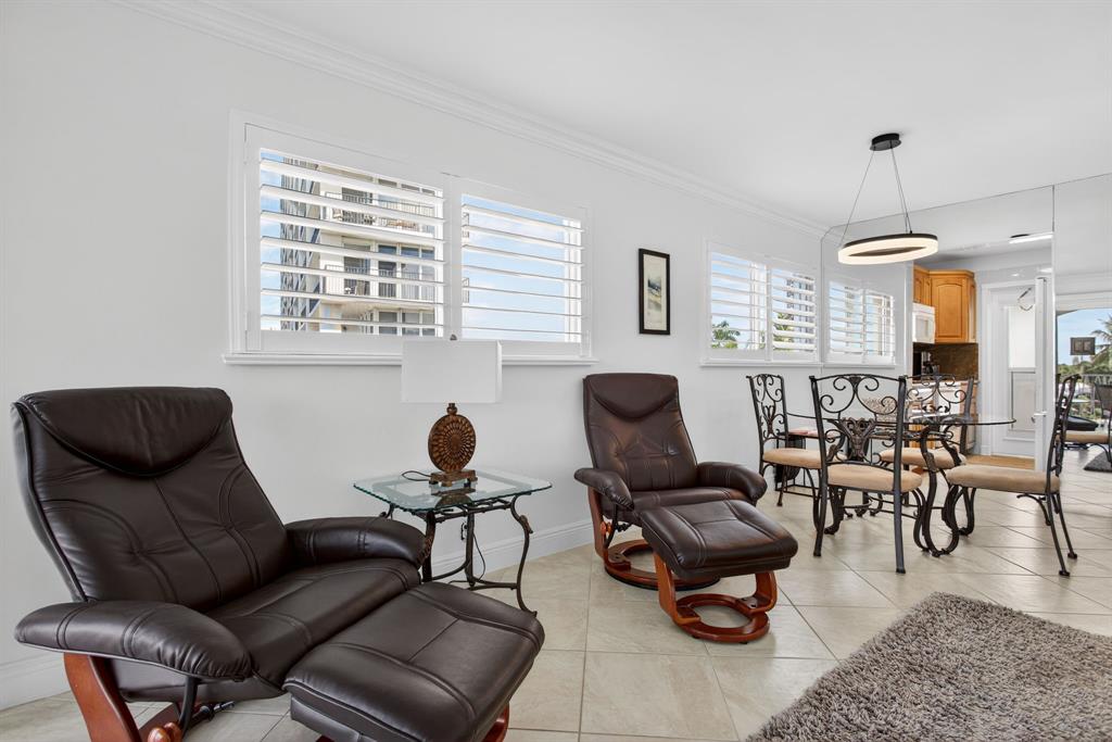 505 North Riverside Drive, Unit 21 Pompano Beach, FL 33062 - Photo 8 of 24 a living room with furniture