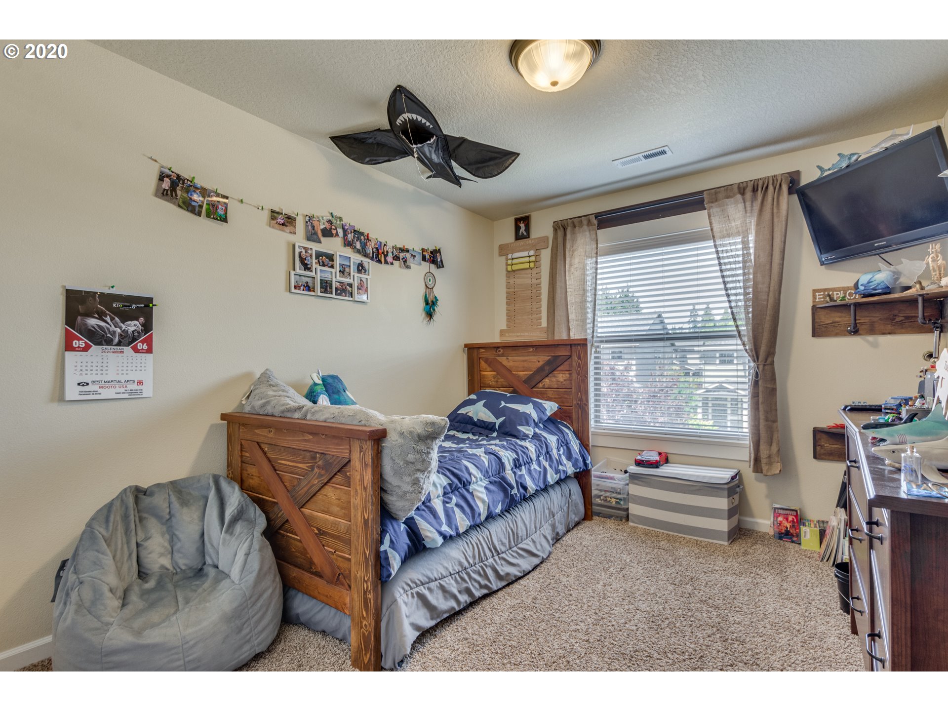 4009 North 5th Way Ridgefield, WA 98642 - Photo 19 of 32 a bedroom with furniture and a window