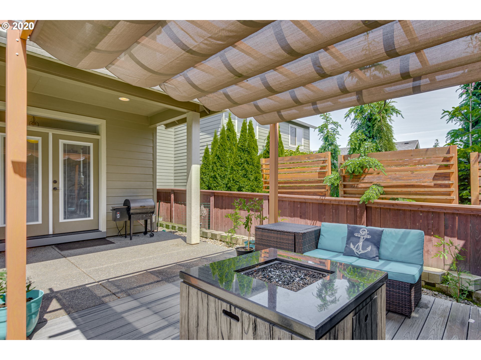 4009 North 5th Way Ridgefield, WA 98642 - Photo 23 of 32 a outdoor living space with furniture and a rug