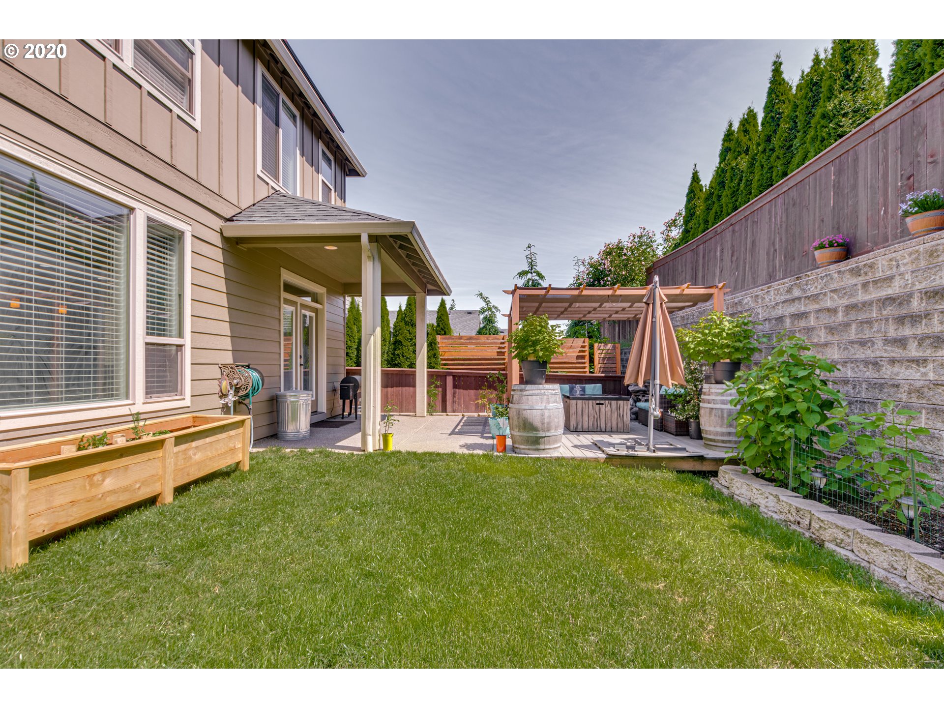 4009 North 5th Way Ridgefield, WA 98642 - Photo 27 of 32 a view of a house with a yard porch and sitting area