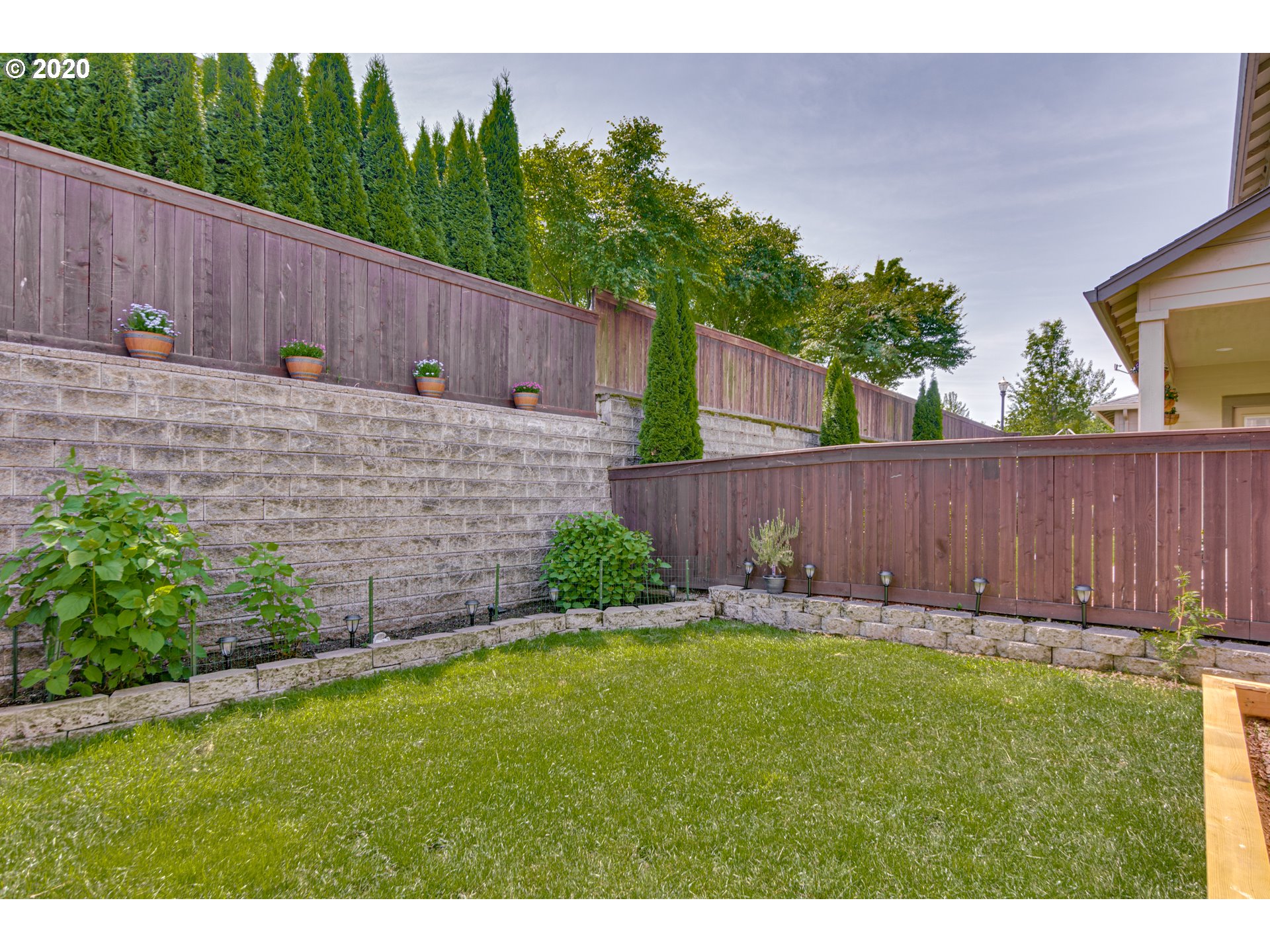 4009 North 5th Way Ridgefield, WA 98642 - Photo 29 of 32 a backyard of a house with lots of green space