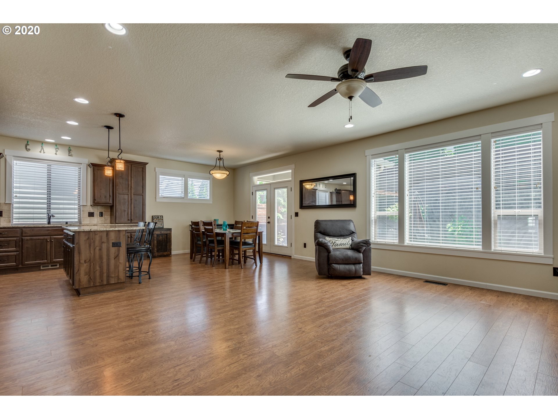 4009 North 5th Way Ridgefield, WA 98642 - Photo 5 of 32 a living room with furniture and a large window