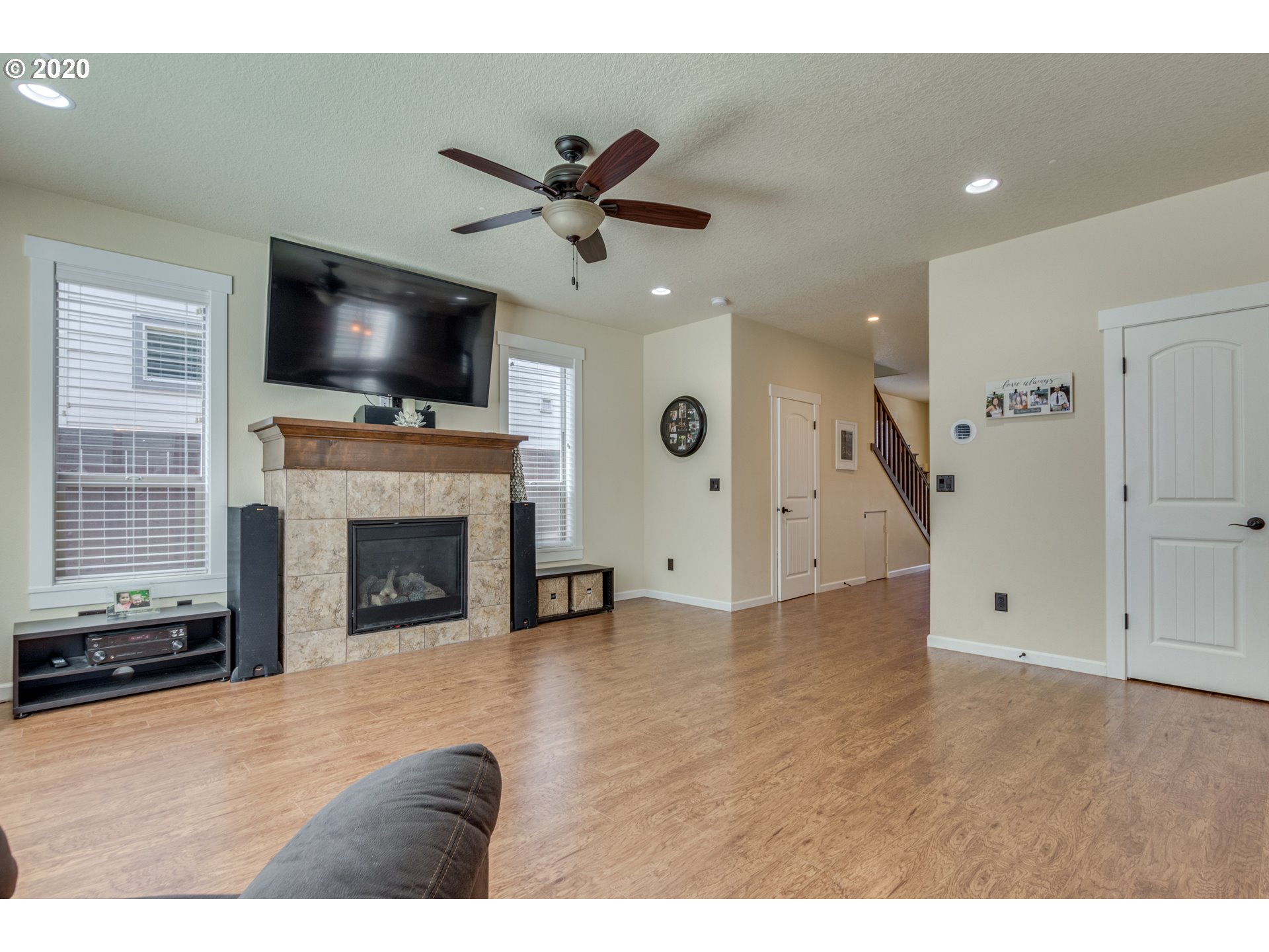 4009 North 5th Way Ridgefield, WA 98642 - Photo 6 of 32 a view of empty room with a flat screen tv and fireplace