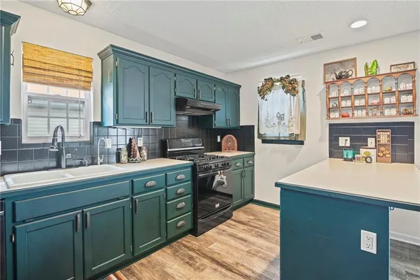 $314,900 | 727 Country Lane, Raymore, MO 64083