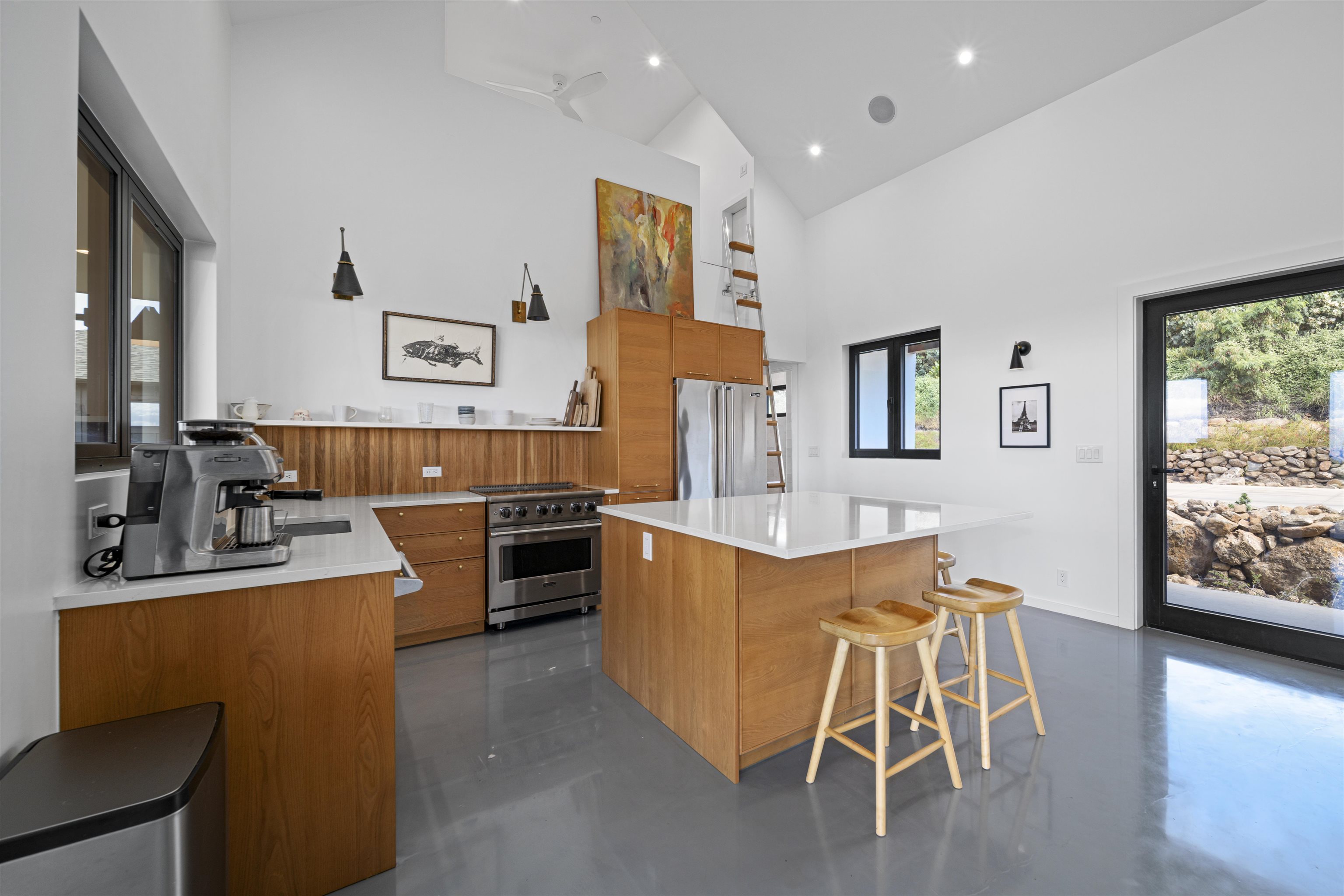 153 Haniu Street, Unit B Lahaina, HI 96761 - Photo 14 of 41 a living room with furniture a flat screen tv and kitchen view