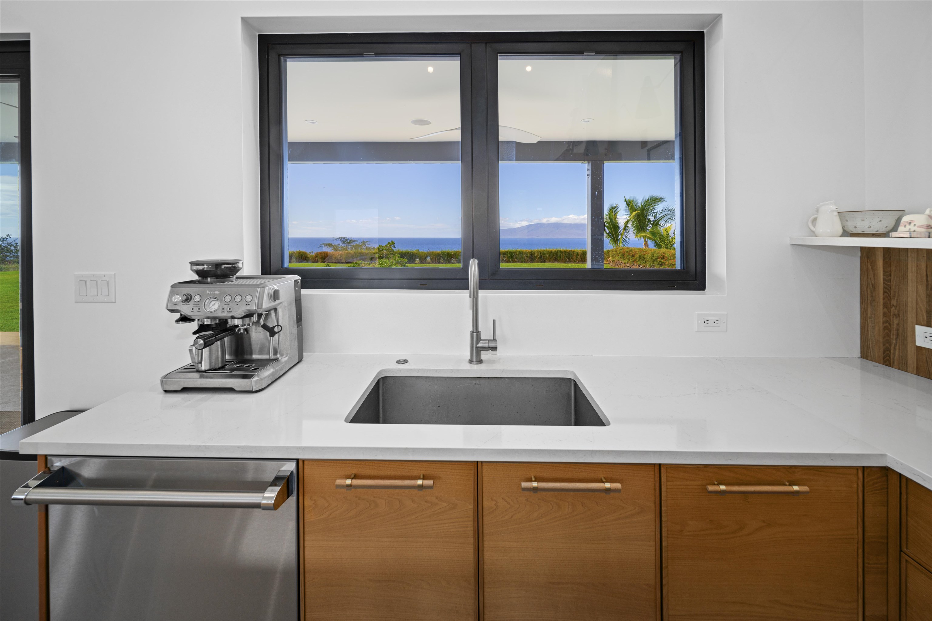 153 Haniu Street, Unit B Lahaina, HI 96761 - Photo 18 of 41 a kitchen with a sink and a window