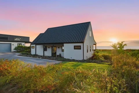 a view of a house with pool and yard