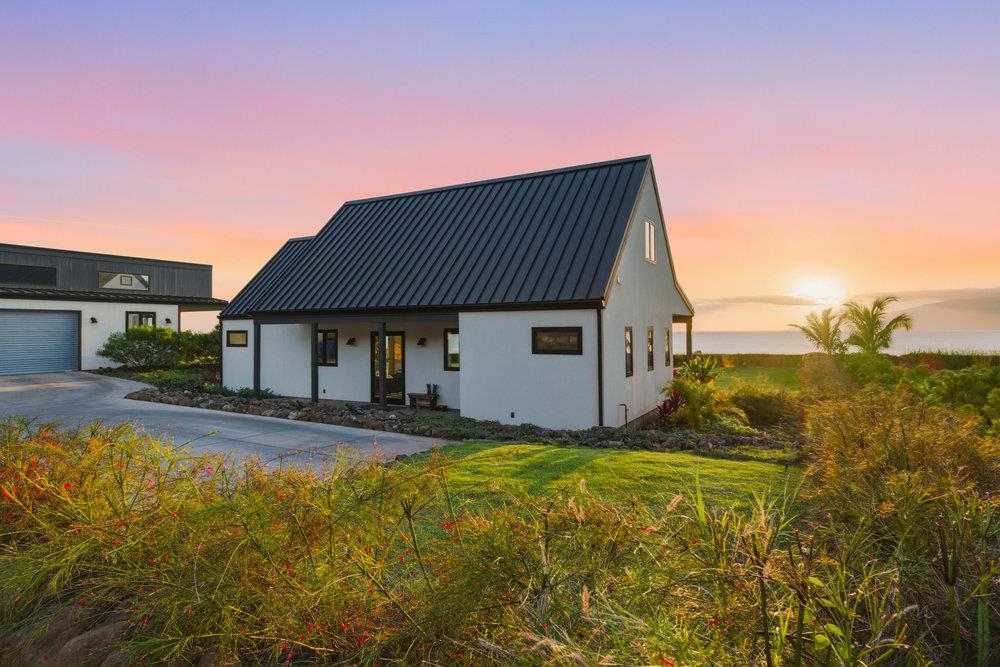 153 Haniu Street, Unit B Lahaina, HI 96761 - Photo 2 of 41 a view of a house with pool and yard