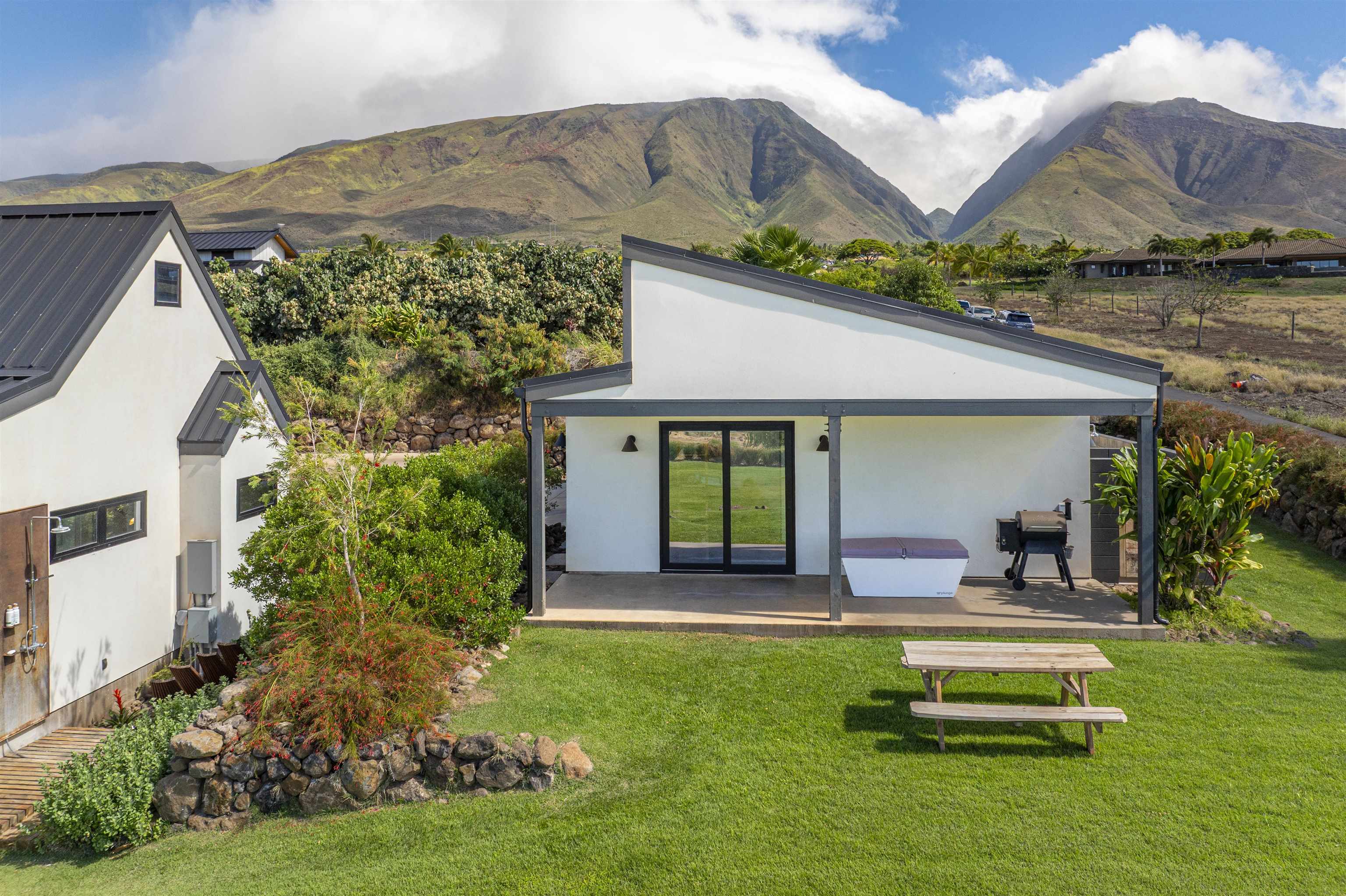 153 Haniu Street, Unit B Lahaina, HI 96761 - Photo 34 of 41 a front view of a house with garden