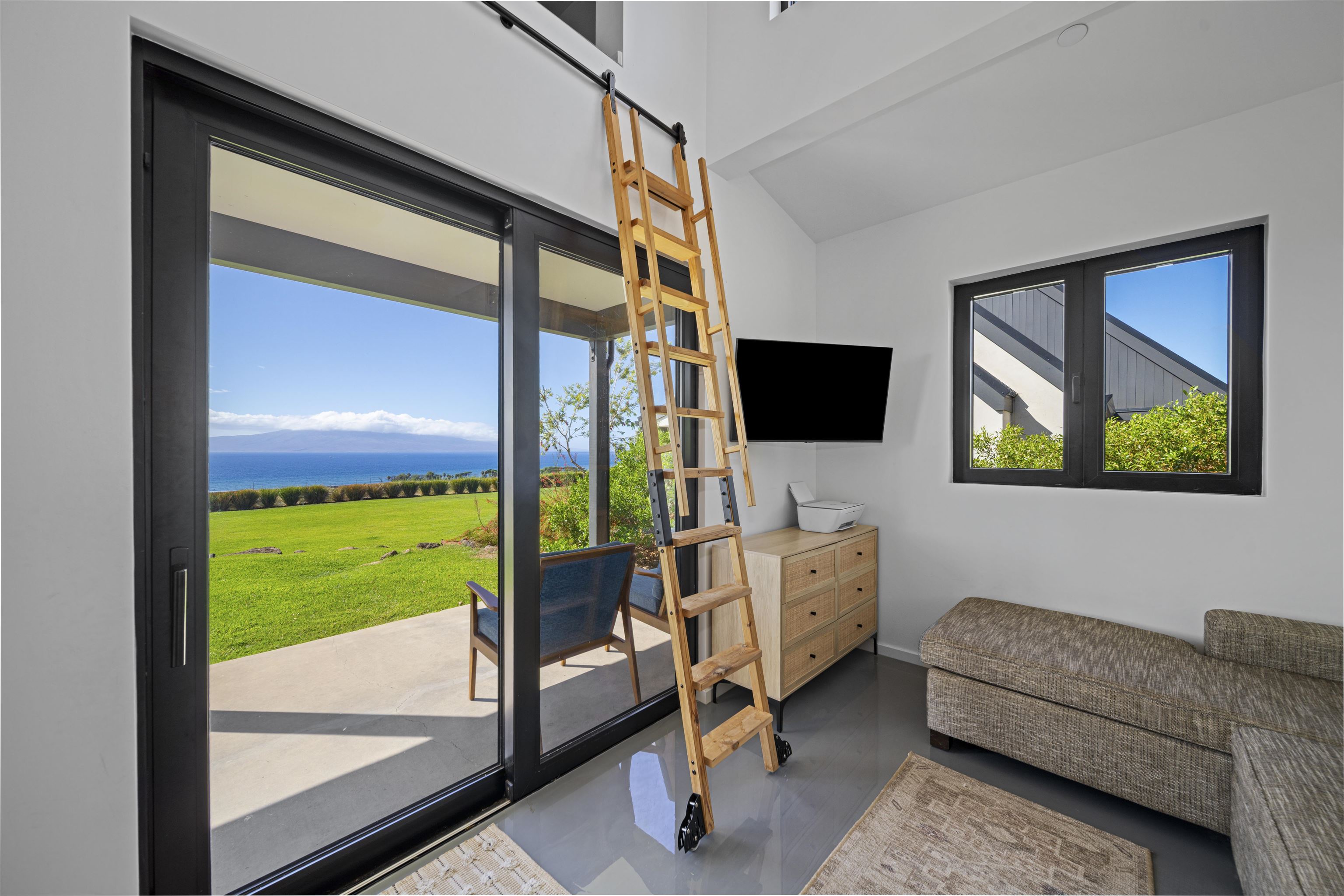 153 Haniu Street, Unit B Lahaina, HI 96761 - Photo 35 of 41 a living room with furniture and a flat screen tv