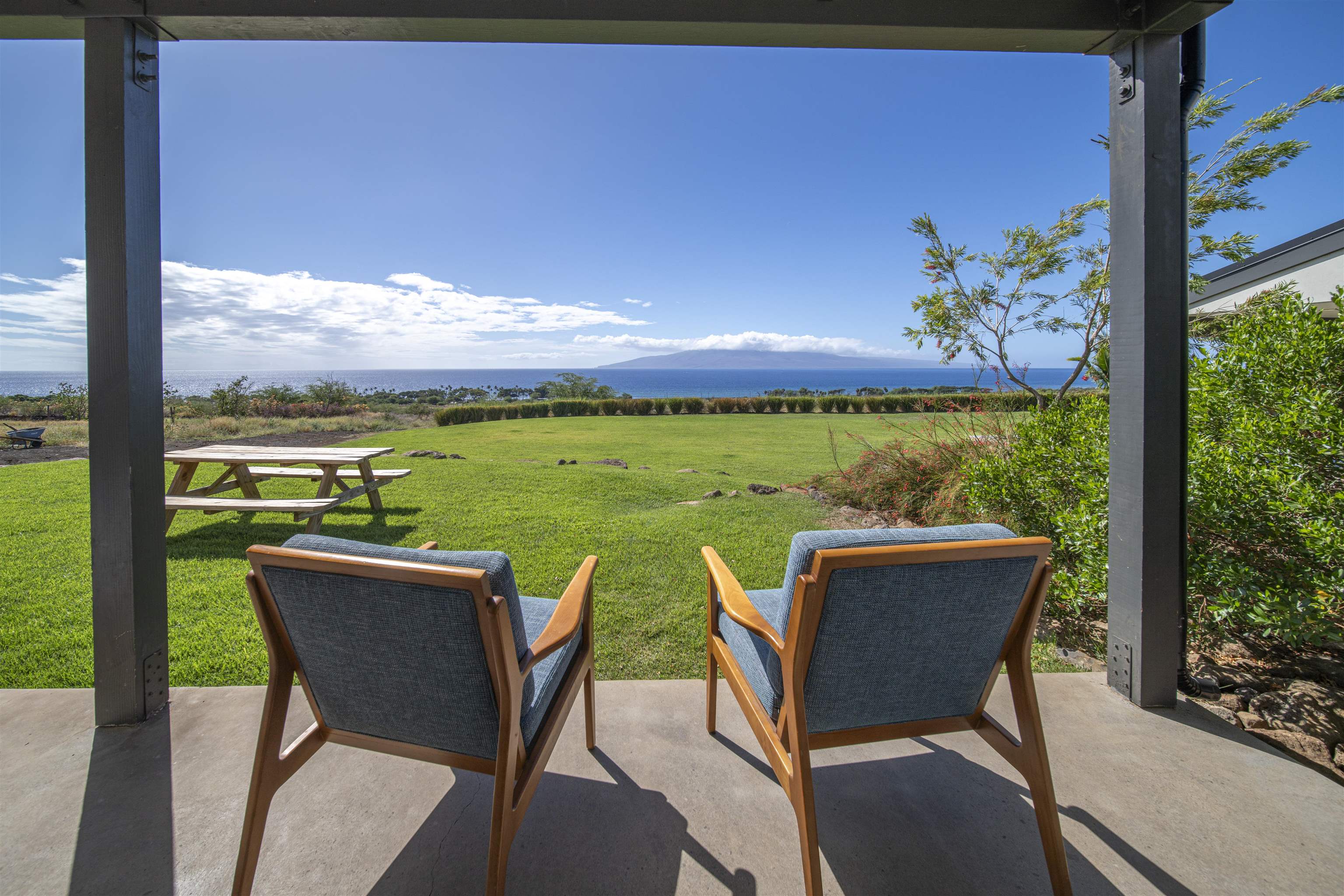 153 Haniu Street, Unit B Lahaina, HI 96761 - Photo 36 of 41 a view of a chairs and table in patio