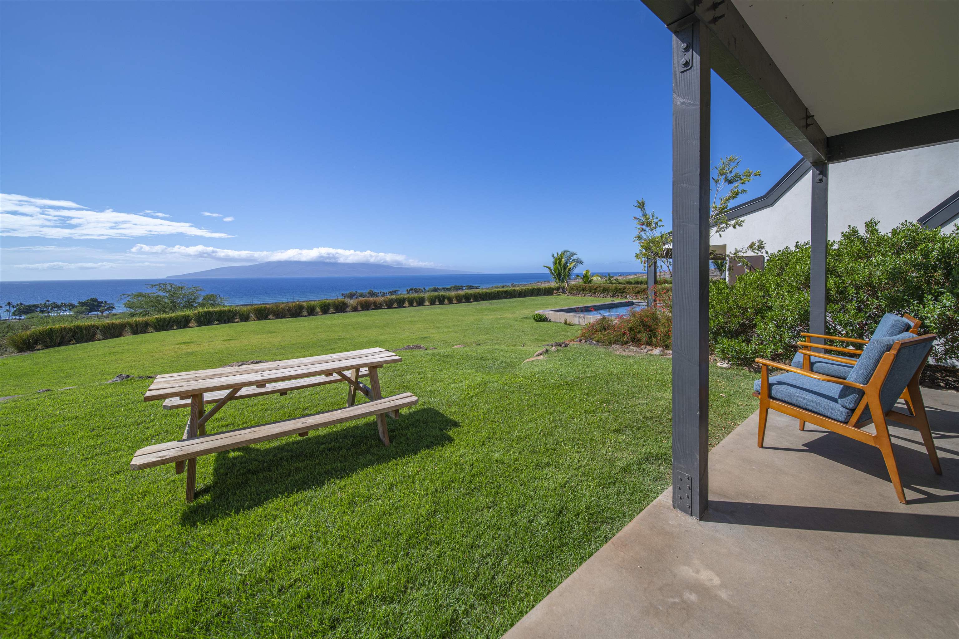 153 Haniu Street, Unit B Lahaina, HI 96761 - Photo 37 of 41 a view of a two chairs in the garden