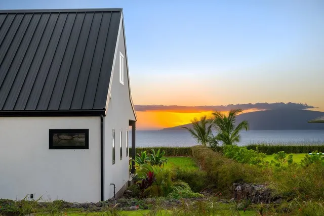 a view of a yard from a balcony