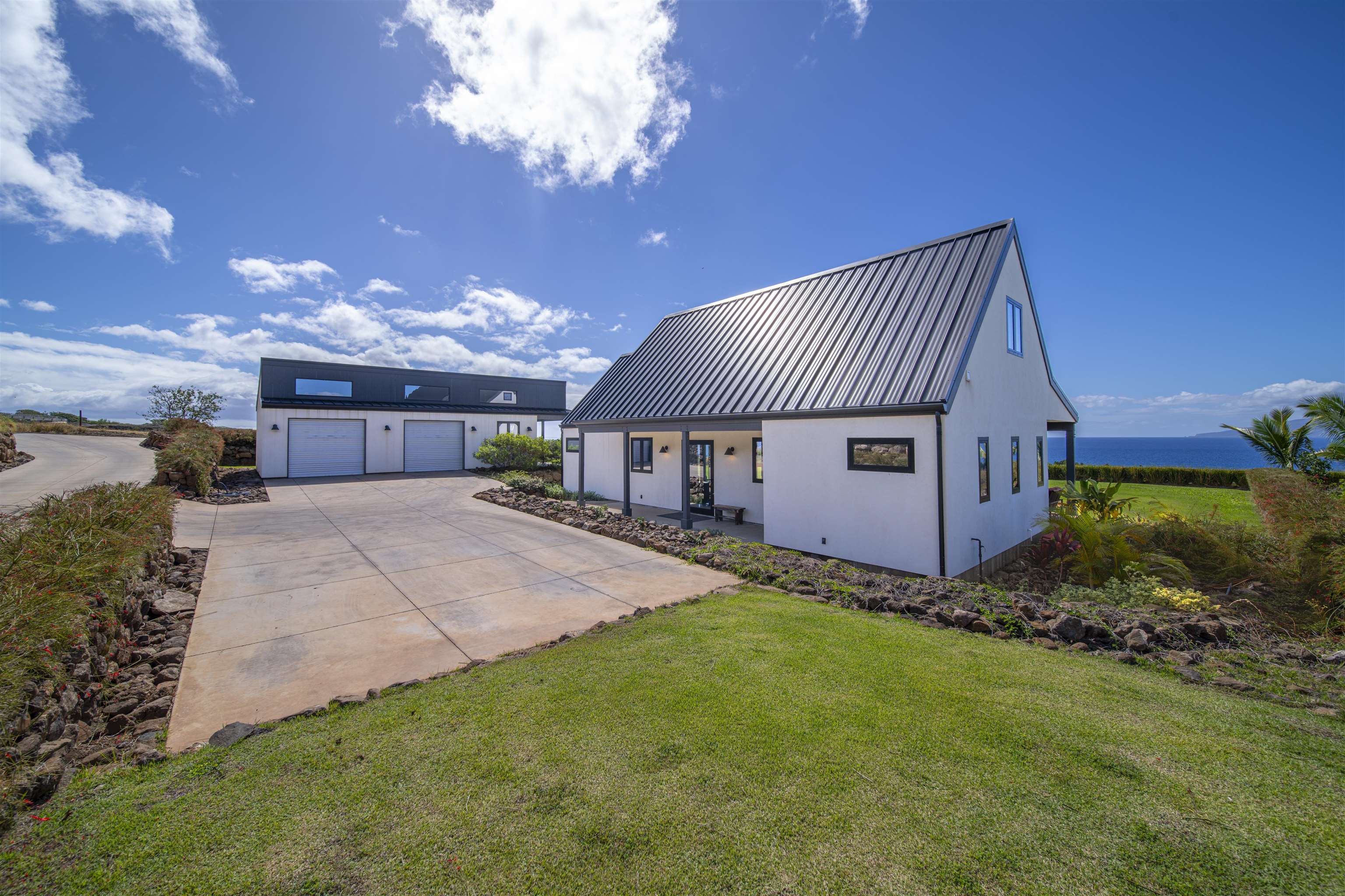 153 Haniu Street, Unit B Lahaina, HI 96761 - Photo 6 of 41 a view of a house with a back yard