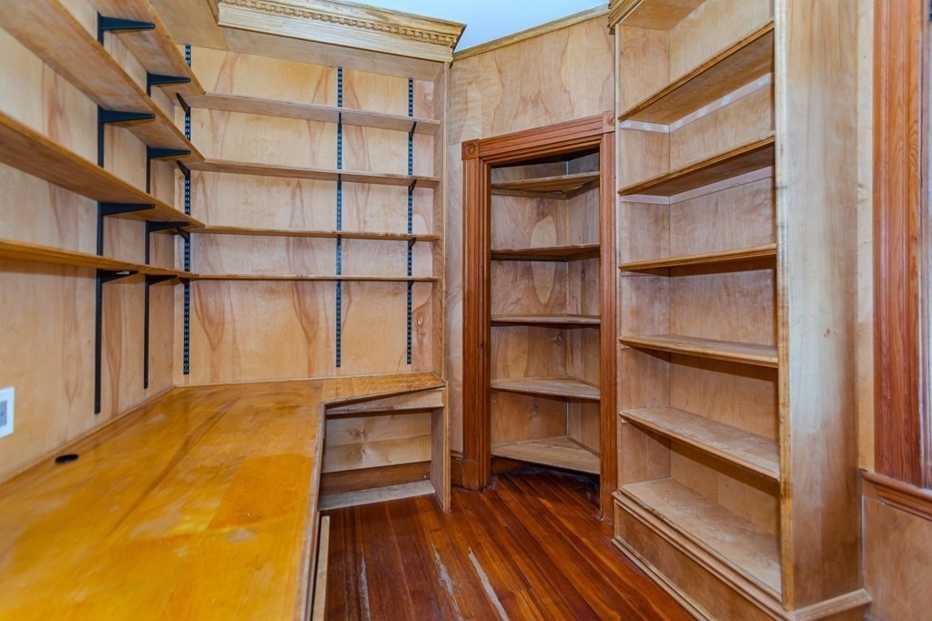 31 Morris Street Everett, MA 02149 - Photo 30 of 42 a view of walk in closet with empty racks