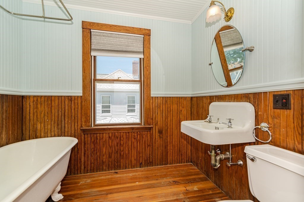 31 Morris Street Everett, MA 02149 - Photo 37 of 42 a bathroom with a sink toilet and a bathtub