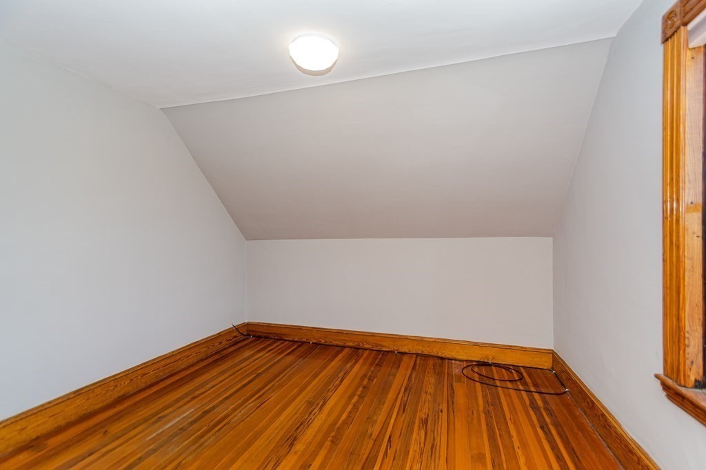 31 Morris Street Everett, MA 02149 - Photo 38 of 42 a view of a room with wooden floor and small space