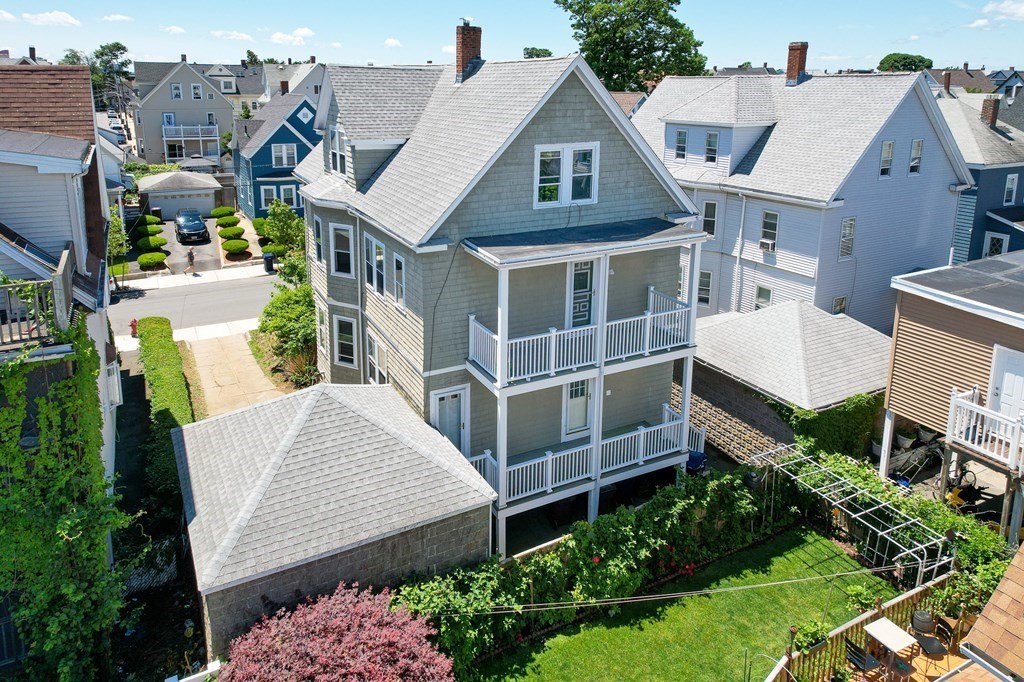 31 Morris Street Everett, MA 02149 - Photo 6 of 42 a view of multiple houses with a yard