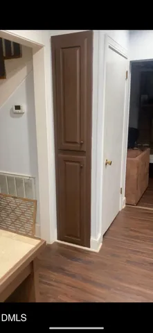 a view of kitchen with stainless steel appliances granite countertop refrigerator and stove