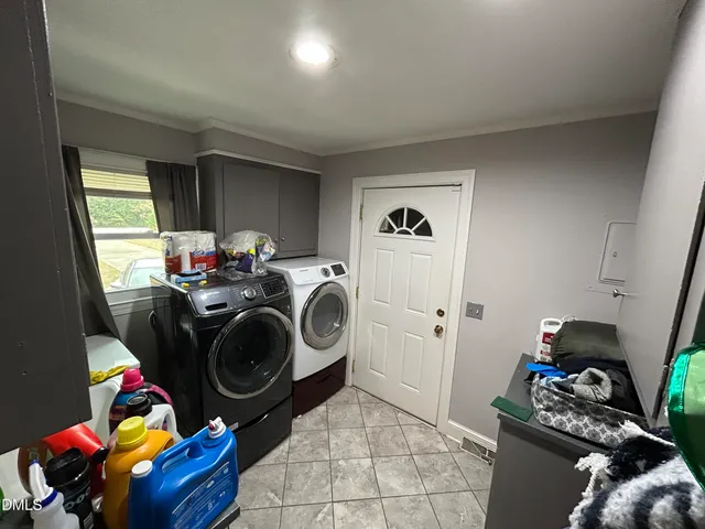 a view of a lobby area with gym equipment