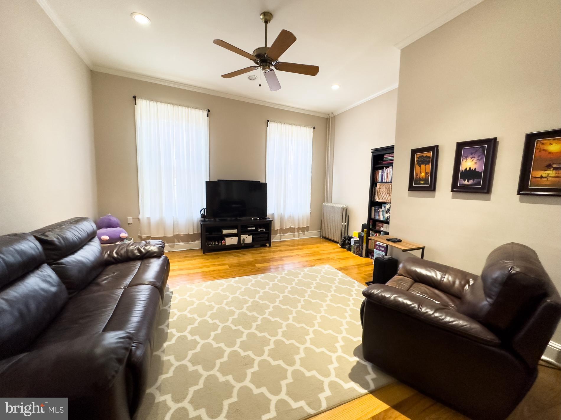 713 South 4th Street Philadelphia, PA 19147 - Photo 13 of 85 a living room with furniture and a flat screen tv