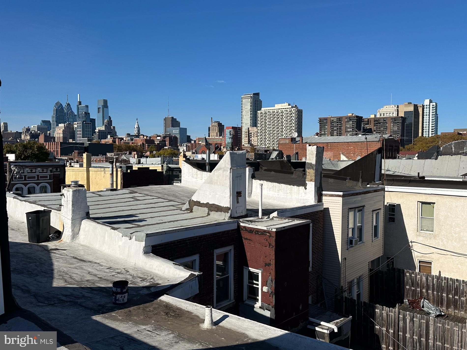 713 South 4th Street Philadelphia, PA 19147 - Photo 22 of 85 a view of a balcony with chairs and wooden floor