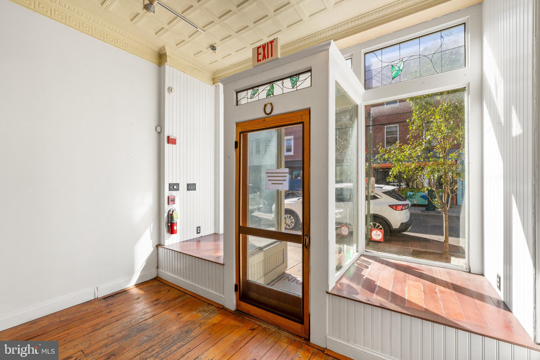713 South 4th Street Philadelphia, PA 19147 - Photo 31 of 85 a very nice looking room with a large window and wooden floor
