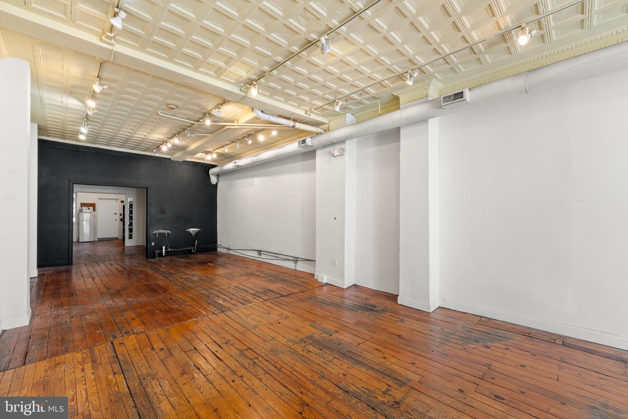 713 South 4th Street Philadelphia, PA 19147 - Photo 33 of 85 a view of empty room with wooden floor
