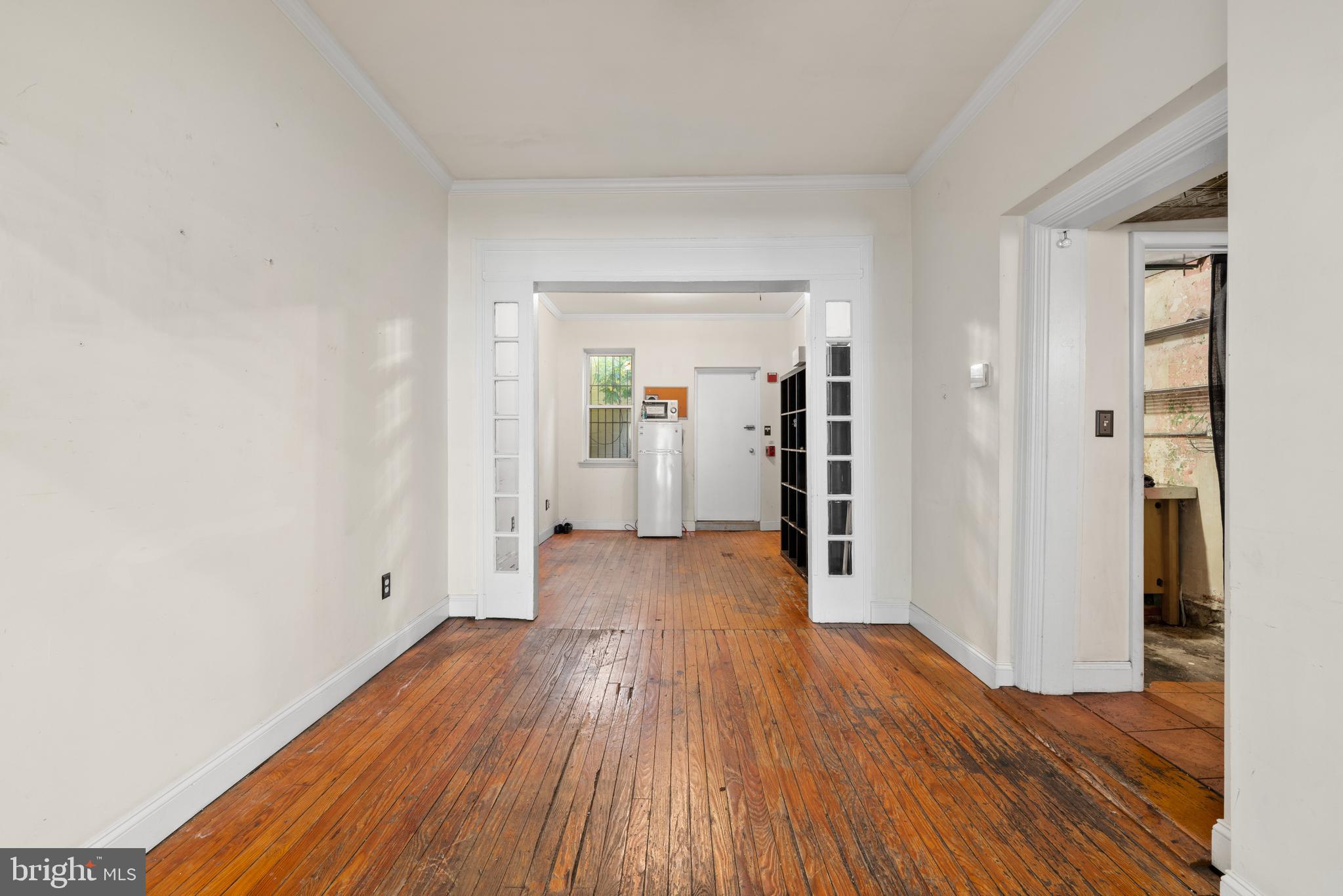 713 South 4th Street Philadelphia, PA 19147 - Photo 35 of 85 a view of a room with wooden floor and stairs