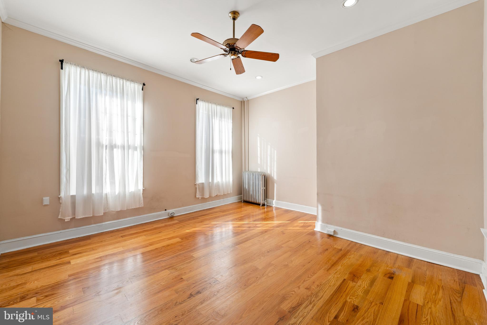 713 South 4th Street Philadelphia, PA 19147 - Photo 46 of 85 wooden floor in an empty room with a window