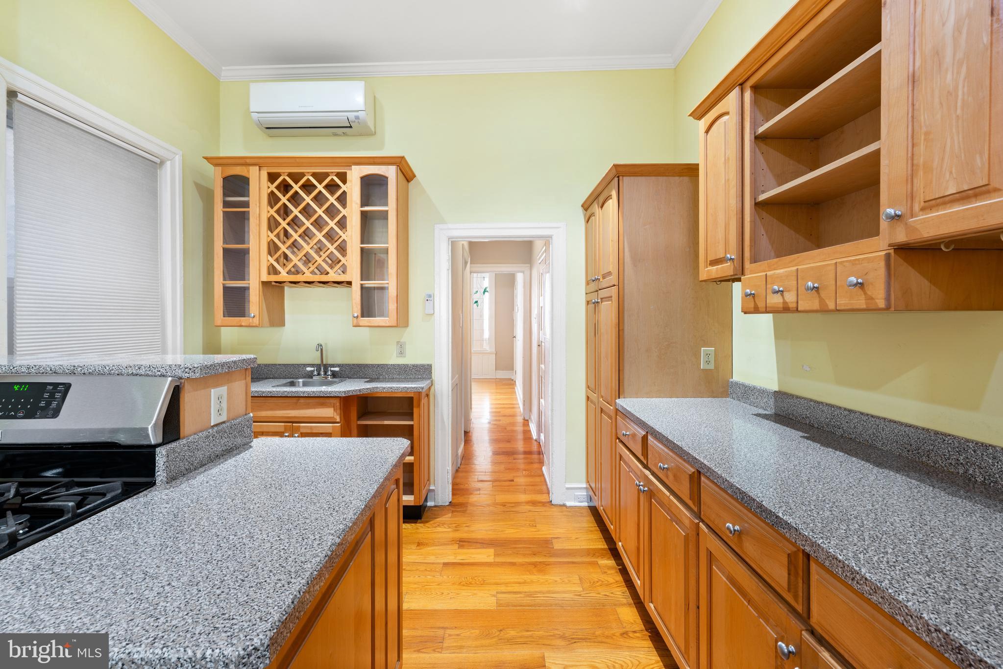 713 South 4th Street Philadelphia, PA 19147 - Photo 49 of 85 a kitchen with stainless steel appliances granite countertop a sink and a refrigerator