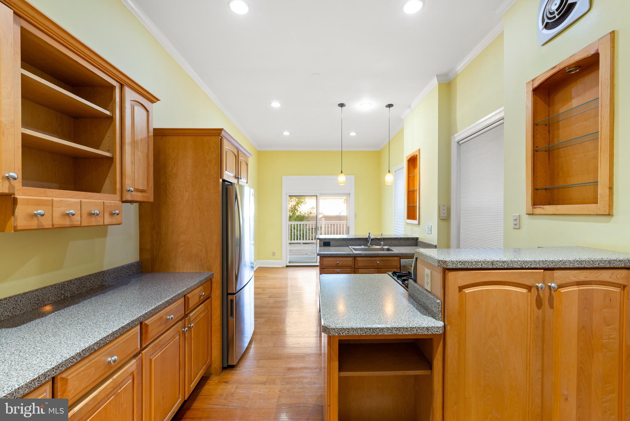 713 South 4th Street Philadelphia, PA 19147 - Photo 54 of 85 a kitchen with stainless steel appliances granite countertop a sink a stove and a refrigerator