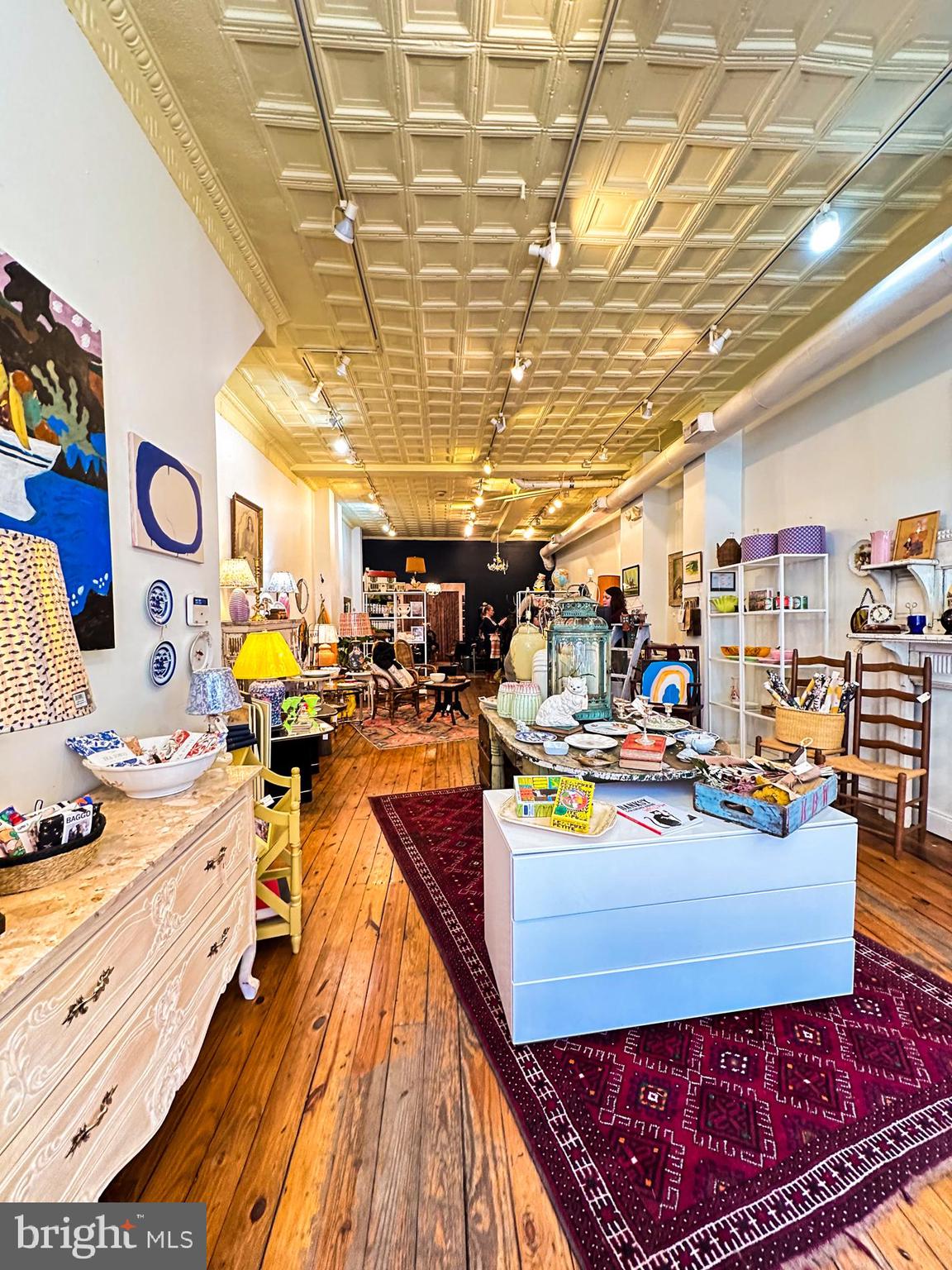 713 South 4th Street Philadelphia, PA 19147 - Photo 6 of 85 a living room with lots of furniture and kitchen view