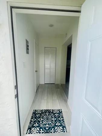 a view of a closet in a bathroom