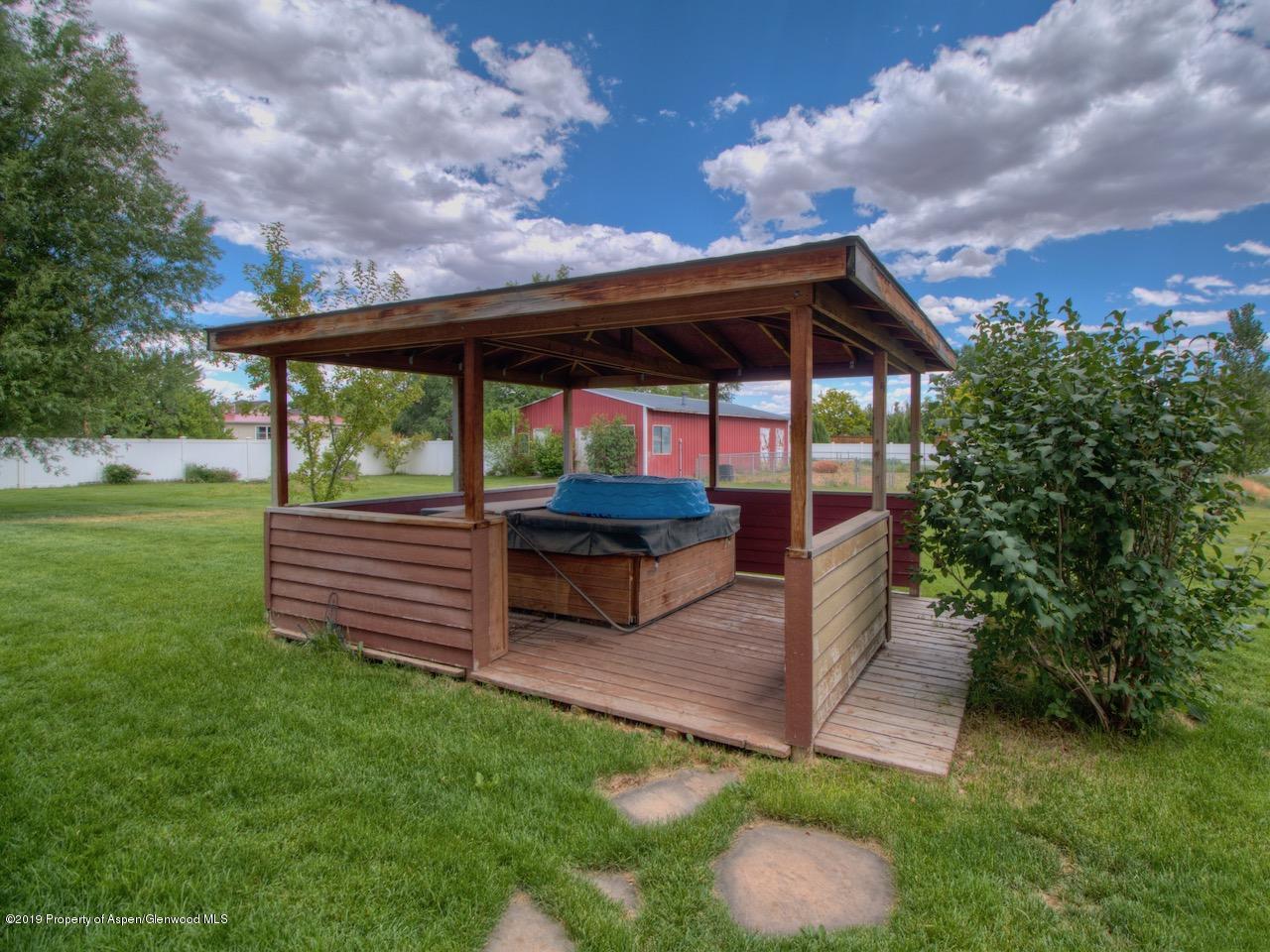 1763 K 6/10 Road Fruita, CO 81521 - Photo 8 of 29 a backyard view with a seating space