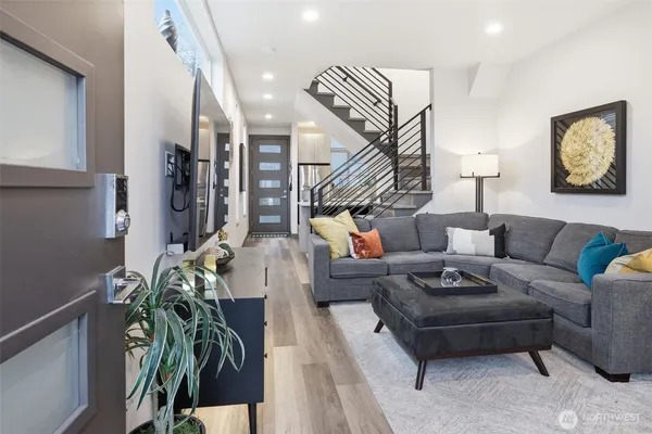 a living room with furniture a chandelier