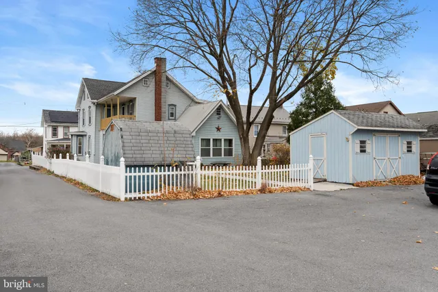 a front view of a house with a outdoor space